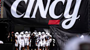 Cincinnati Bearcats head coach Scott Satterfield stands with his team before taking the field before the NCAA football game between the Cincinnati Bearcats and Bowling Green Falcons at Nippert Stadium in Cincinnati on Sept. 6, 2025.