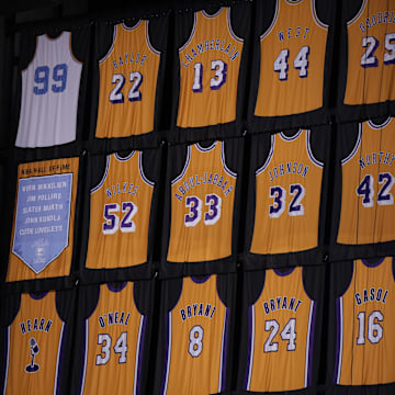 May 8, 2023; Los Angeles, California, USA; The Los Angeles Lakers retired jereys of Kareem Abdul-Jabbar (33), Elgin Baylor (22), Kobe Bryant (8 and 24), Pau Gasol (16), Gail Goodrich (25), Magic Johnson (32), Shaquille O'Neal (34), jerry West (44), Jamaal Wilkes (52), James Worthy (42), George Mikan (99) and Chick Hearn during game four of the 2023 NBA playoffs at Crypto.com Arena. Mandatory Credit: Kirby Lee-Imagn Images