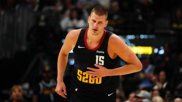 May 19, 2024; Denver, Colorado, USA; Denver Nuggets center Nikola Jokic (15) following a score in the first half against the Minnesota Timberwolves in game seven of the second round for the 2024 NBA playoffs at Ball Arena. Mandatory Credit: Ron Chenoy-USA TODAY Sports