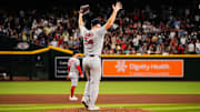 Sep 6, 2025; Phoenix, Arizona, USA; Boston Red Sox pitcher Lucas Giolito (54) celebrates after Boston Red Sox outfielder Ceddanne Rafaela (3) robs a home run during the fifth inning against the Arizona Diamondbacks at Chase Field.
