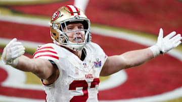 Feb 11, 2024; Paradise, Nevada, USA; San Francisco 49ers running back Christian McCaffrey (23) celebrates after scoring a touchdown against the Kansas City Chiefs in the first half in Super Bowl LVIII at Allegiant Stadium. Mandatory Credit: Stephen R. Sylvanie-Imagn Images
