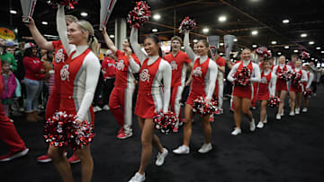 The Ohio State Buckeyes cheerleaders at the College Football Playoff Fan Central at the Georgia World Congress Center. 