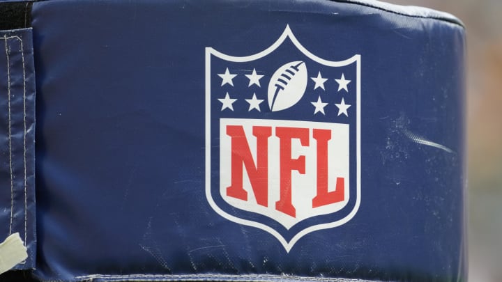 Aug 24, 2024; Green Bay, Wisconsin, USA;  General view of the NFL logo on a goalpost during warmups prior to the game between the Baltimore Ravens and Green Bay Packers at Lambeau Field. Mandatory Credit: Jeff Hanisch-USA TODAY Sports