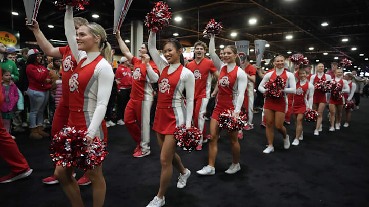 The Ohio State Buckeyes cheerleaders at the College Football Playoff Fan Central at the Georgia World Congress Center. 