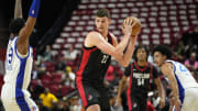 Jul 15, 2024; Las Vegas, NV, USA; Portland Trail Blazers center Donovan Clingan (23) controls the ball against the Philadelphia 76ers  during the first half at Thomas & Mack Center. Mandatory Credit: Lucas Peltier-USA TODAY Sports