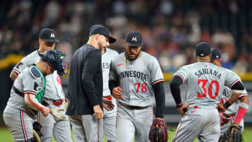 Jun 26, 2024; Phoenix, Arizona, USA; Minnesota Twins manager Rocco Baldelli (5) takes Minnesota Twins pitcher Simeon Woods Richardson (78) out of the game against the Arizona Diamondbacks during the sixth inning at Chase Field. Mandatory Credit: Joe Camporeale-USA TODAY Sports