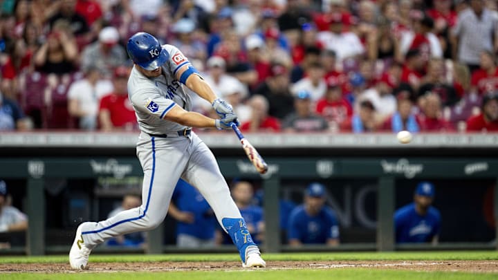 Aug 17, 2024; Cincinnati, Ohio, USA; Kansas City Royals right fielder Hunter Renfroe (16) hits a base hit against the Cincinnati Reds in the fifth inning at Great American Ball Park. Mandatory Credit: Albert Cesare/The Cincinnati Enquirer-Imagn Images