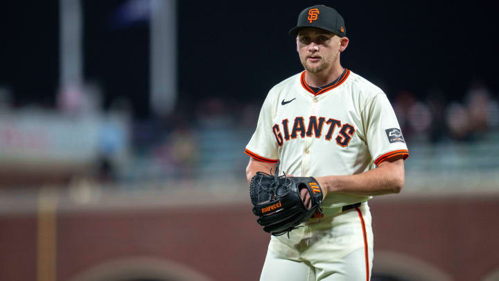 Apr 22, 2024; San Francisco, California, USA;  San Francisco Giants pitcher Keaton Winn (67) heads to the bench after being relived during the seventh inning against the New York Mets at Oracle Park