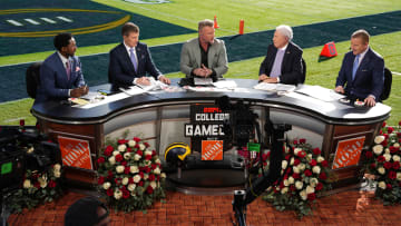 Jan 1, 2024; Pasadena, CA, USA; From left: Desmond Howard, Rece Davis, Pat McAfee, Lee Corso and Kirk Herbstreit on the ESPN College Gameday set at the 2024 Rose Bowl college football playoff semifinal game at Rose Bowl. Mandatory Credit: Kirby Lee-USA TODAY Sports