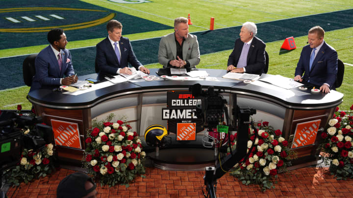 Jan 1, 2024; Pasadena, CA, USA; From left: Desmond Howard, Rece Davis, Pat McAfee, Lee Corso and Kirk Herbstreit on the ESPN College Gameday set at the 2024 Rose Bowl college football playoff semifinal game at Rose Bowl. Mandatory Credit: Kirby Lee-USA TODAY Sports