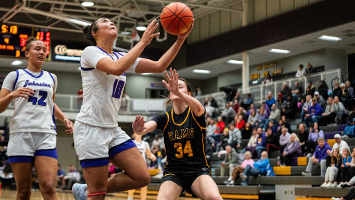 Johnston's Jenica Lewis (10) takes a shot near the basket on Tuesday, Dec. 3, 2024, at Johnston High School. Johnston's Jenica Lewis (10) takes a shot near the basket on Tuesday, Dec. 3, 2024, at Johnston High School.