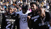 Colorado Buffaloes safety Shilo Sanders, head coach Deion Sanders, quarterback Shedeur Sanders, and Deion Sanders Jr. 