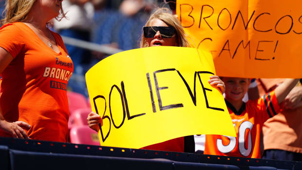 Denver Broncos fan holds a sign in reference to quarterback Bo Nix (10) 