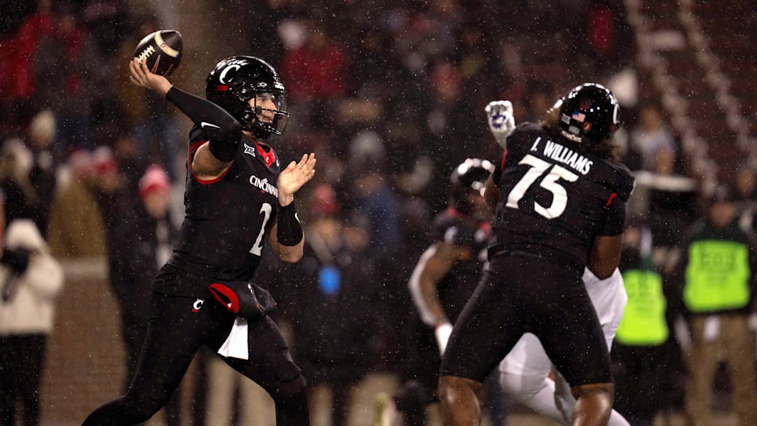 Nov 30, 2024; Cincinnati, Ohio, USA; Cincinnati Bearcats quarterback Brendan Sorsby (2) throws a pass against the TCU Horned Frogs in the third quarter at Nippert Stadium. Mandatory Credit: Albert Cesare/USA TODAY Network via Imagn Images