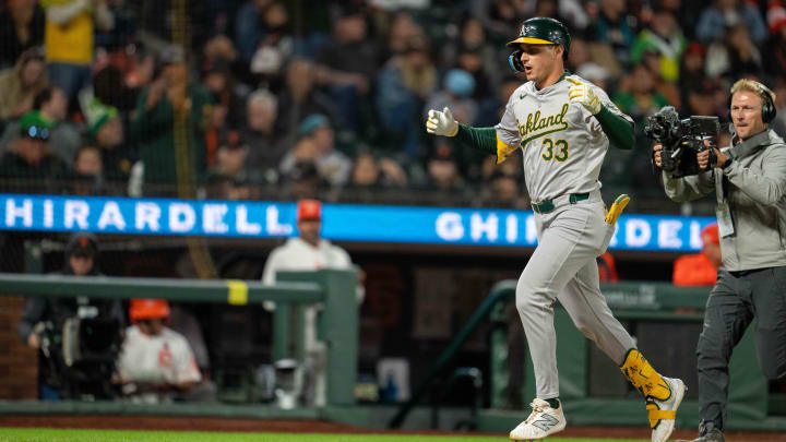 Jul 30, 2024; San Francisco, California, USA;  Oakland Athletics outfielder JJ Bleday (33) celebrates as he crosses home plate during the eighth inning against the San Francisco Giants at Oracle Park. Mandatory Credit: Neville E. Guard-USA TODAY Sports