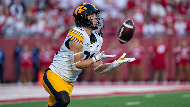Oct 11, 2025; Madison, Wisconsin, USA; Iowa Hawkeyes wide receiver Kaden Wetjen (21) receives the opening kickoff against the Wisconsin Badgers at Camp Randall Stadium. Mandatory Credit: Ross Harried-Imagn Images
