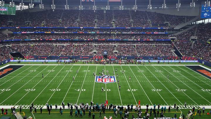 Oct 13, 2024; London, United Kingdom; A general view as Jacksonville Jaguars quarterback Trevor Lawrence (16) prepares to take the snap against the Chicago Bears on the NFL shield logo during an NFL International Series game at Tottenham Hotspur Stadium. Mandatory Credit: Kirby Lee-Imagn Images