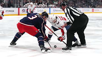 Blue Jackets center Charlie Coyle takes a faceoff against the Washington Capitals.
