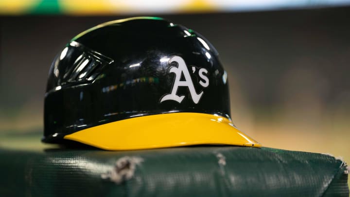 Jul 23, 2024; Oakland, California, USA;  General view of an Oakland Athletics helmet after defeating the Houston Astros at Oakland-Alameda County Coliseum. Mandatory Credit: Stan Szeto-USA TODAY Sports