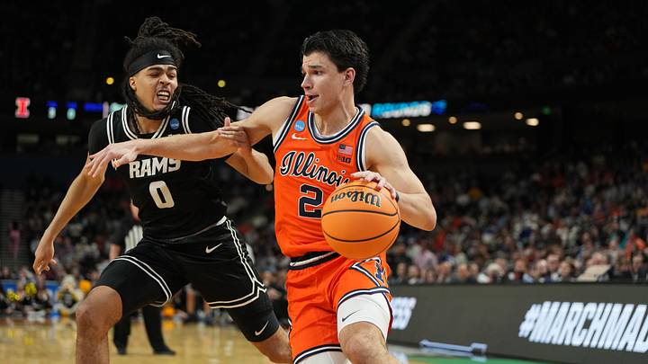 Mar 21, 2026; Greenville, SC, USA; VCU Rams guard Brandon Jennings (0) defends against Illinois Fighting Illini guard Andrej Stojakovic (2) during the second half during a second round game of the men's 2026 NCAA Tournament at Bon Secours Wellness Arena. Mandatory Credit: Bob Donnan-Imagn Images