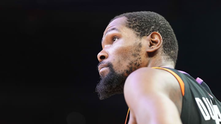 Apr 26, 2024; Phoenix, Arizona, USA; Phoenix Suns forward Kevin Durant (35) looks on against the Minnesota Timberwolves during the second half of game three of the first round for the 2024 NBA playoffs at Footprint Center. Mandatory Credit: Joe Camporeale-Imagn Images Apr 26, 2024; Phoenix, Arizona, USA; Phoenix Suns forward Kevin Durant (35) looks on against the Minnesota Timberwolves during the second half of game three of the first round for the 2024 NBA playoffs at Footprint Center. Mandatory Credit: Joe Camporeale-Imagn Images