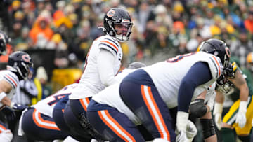 Jan 5, 2025; Green Bay, Wisconsin, USA;  Chicago Bears quarterback Caleb Williams (18) during the game against the Chicago Bears at Lambeau Field. Mandatory Credit: Jeff Hanisch-Imagn Images