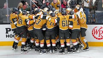 Apr 29, 2025; Las Vegas, Nevada, USA; Vegas Golden Knights players celebrate after the Golden Knights defeated the Minnesota Wild 3-2 in overtime in game five of the first round of the 2025 Stanley Cup Playoffs at T-Mobile Arena. Mandatory Credit: Stephen R. Sylvanie-Imagn Images
