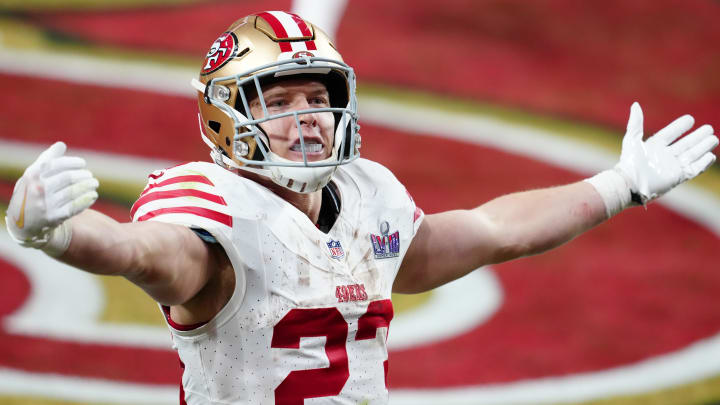 Feb 11, 2024; Paradise, Nevada, USA; San Francisco 49ers running back Christian McCaffrey (23) celebrates after scoring a touchdown against the Kansas City Chiefs in the first half in Super Bowl LVIII at Allegiant Stadium. Mandatory Credit: Stephen R. Sylvanie-USA TODAY Sports