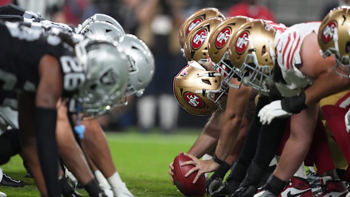 Aug 23, 2024; Paradise, Nevada, USA; A general overall view of San Francisco 49ers and Las Vegas Raiders helmets at the line of scrimmage at Allegiant Stadium. Mandatory Credit: Kirby Lee-Imagn Images