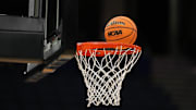 Apr 3, 2025; Tampa, FL, USA; A Wilson EVO Nxt basketball ball with the 2025 NCAA Women's Final Four logo approaches the rim and the net at Amalie Arena. Mandatory Credit: Kirby Lee-Imagn Images