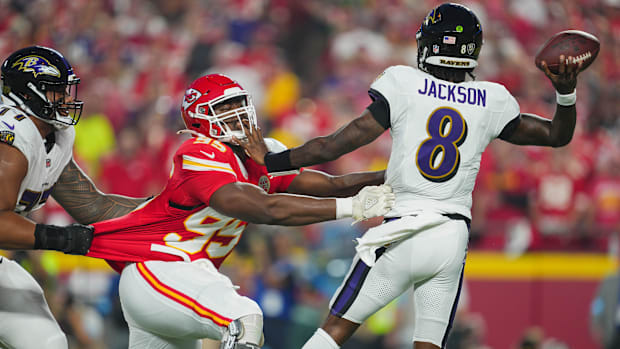 Kansas City Chiefs defensive tackle Chris Jones (95) rushes Baltimore Ravens quarterback Lamar Jackson (8) in Week 1 of 2024.