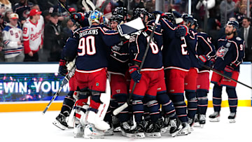 The Columbus Blue Jackets celebrate their win over the Detroit Red Wings on Thursday night. 