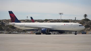Feb 8, 2022; Los Angeles, CA, USA; General view of the Delta plane arriving Los Angeles International Airport carrying the Cincinnati Bengals team as they arrive prior to Super Bowl LVI. Mandatory Credit: Kirby Lee-Imagn Images