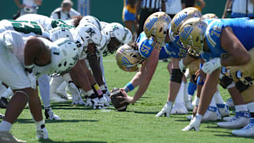 Aug 28, 2021; Pasadena, California, USA; A general overall view of the line of scrimmage as UCLA Bruins long snapper Jack Landherr IV (51) snaps the ball against the Hawaii Rainbow Warriors  at Rose Bowl. Mandatory Credit: Kirby Lee-USA TODAY Sports