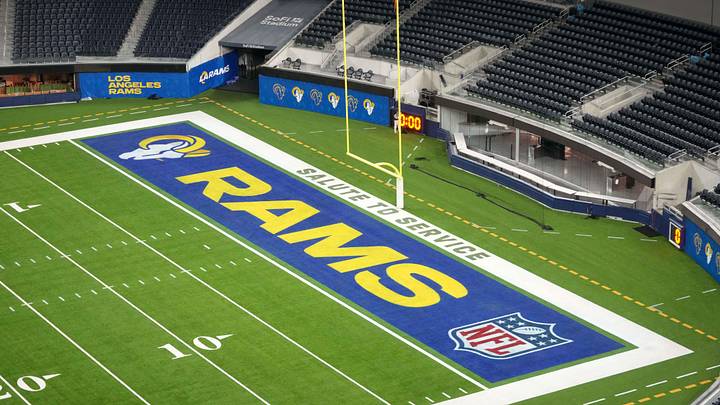 Nov 11, 2024; Inglewood, California, USA; The Los Angeles Rams and Salute to Service logos in the end zone at SoFi Stadium. Mandatory Credit: Kirby Lee-Imagn Images