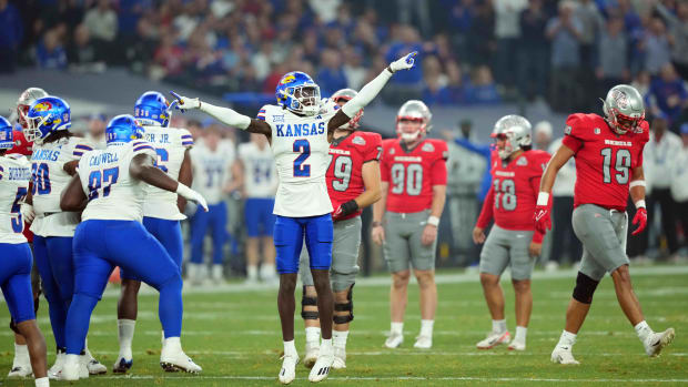 Dec 26, 2023; Phoenix, AZ, USA; Kansas Jayhawks cornerback Cobee Bryant (2) celebrates a missed field goal by UNLV Rebels pla