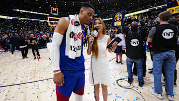 May 3, 2025; Denver, Colorado, USA; Denver Nuggets guard Russell Westbrook (4) is interviewed by ESPN reporter Betty Zhou following the win against the LA Clippers in the game seven of first round for the 2025 NBA Playoffs at Ball Arena. Mandatory Credit: Ron Chenoy-Imagn Images