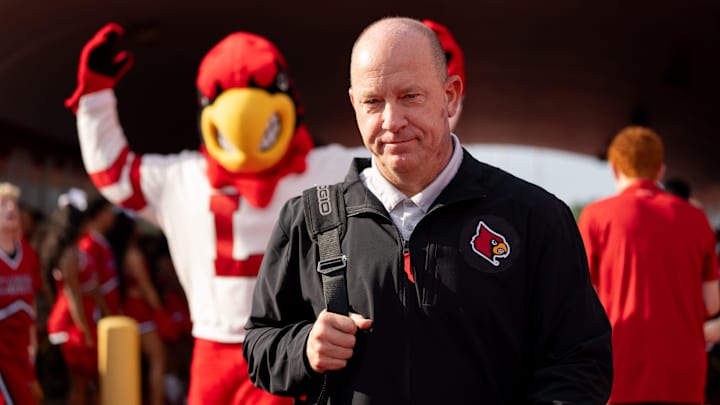 Louisville Cardinals head coach Jeff Brohm walks through the card march ahead of their game on Saturday, Aug. 31, 2024 at L&N Federal Credit Union Stadium in Louisville, Ky.