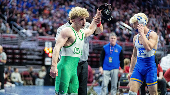 Osage’s Blake Fox wrestles against Humboldt’s Jaxson Kirchhoff at 150 lbs. on Feb. 19, 2026, at Casey’s Center in Des Moines.