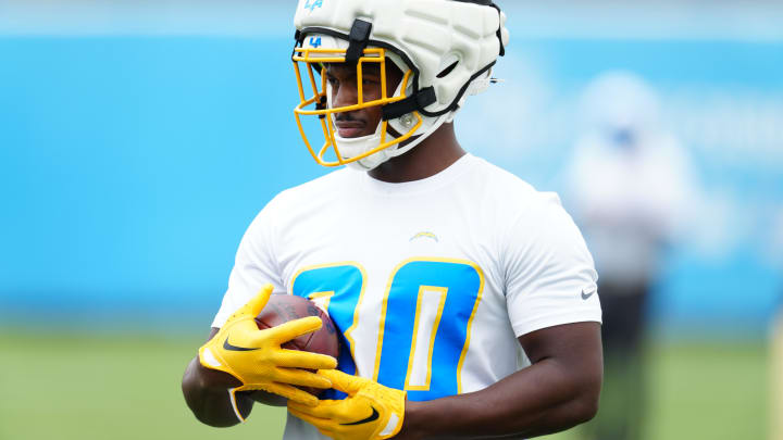 Los Angeles Chargers running back Kimani Vidal (30) wears a Guardian helmet cap during organized team activities at the Hoag Performance Center. Mandatory Credit: Kirby Lee-USA TODAY Sports