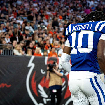 Indianapolis Colts running back Jonathan Taylor (28) and Indianapolis Colts wide receiver Adonai Mitchell (10) celebrate after scoring a touchdown in the first quarter between the Cincinnati Bengals and the Indianapolis Colts at Paycor Stadium in Cincinnati on Thursday, Aug. 22, 2024.