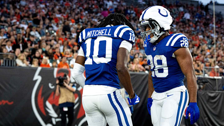 Indianapolis Colts running back Jonathan Taylor (28) and Indianapolis Colts wide receiver Adonai Mitchell (10) celebrate after scoring a touchdown in the first quarter between the Cincinnati Bengals and the Indianapolis Colts at Paycor Stadium in Cincinnati on Thursday, Aug. 22, 2024.