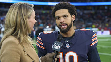 Oct 13, 2024; London, United Kingdom; Stacey Dales, NFL Network reporter, and Chicago Bears quarterback Caleb Williams (18) after an NFL International Series game at Tottenham Hotspur Stadium. Mandatory Credit: Peter van den Berg-Imagn Images