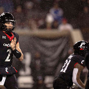 Nov 30, 2024; Cincinnati, Ohio, USA; Cincinnati Bearcats quarterback Brendan Sorsby (2) throws a pass against the TCU Horned Frogs in the third quarter at Nippert Stadium. Mandatory Credit: Albert Cesare/USA TODAY Network via Imagn Images