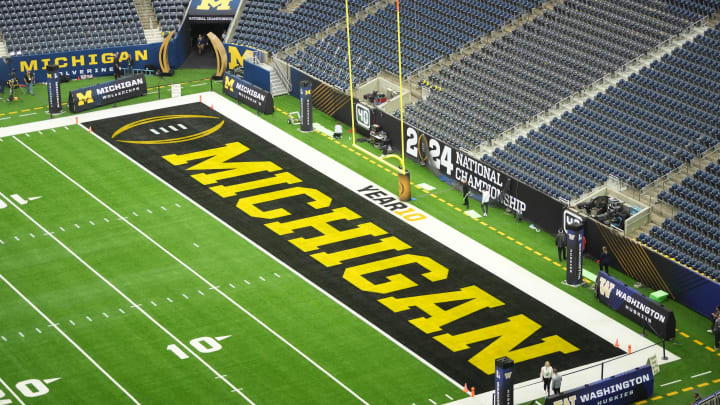 Jan 8, 2024; Houston, TX, USA; The Michigan Wolverines logo in the end zone before the 2024 College Football Playoff national championship game between the Michigan Wolverines and the Washington Huskies at NRG Stadium. Mandatory Credit: Kirby Lee-USA TODAY Sports