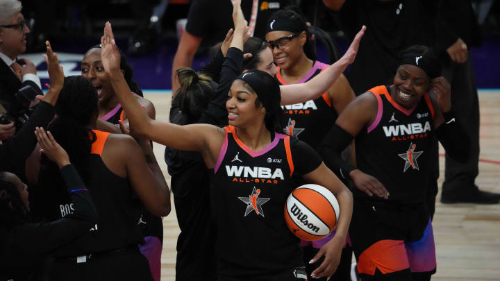 Jul 20, 2024; Phoenix, AZ, USA; Team WNBA forward Angel Reese (5) celebrates with teammaes after the WNBA All Star Game at Footprint Center. Mandatory Credit: Joe Camporeale-USA TODAY Sports