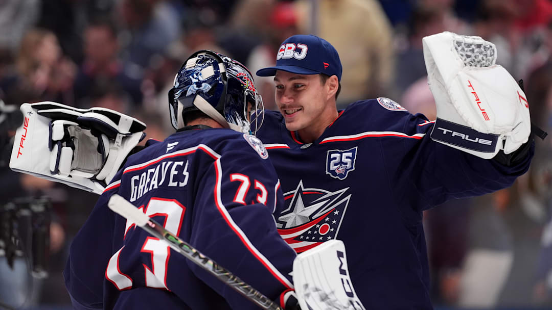 Elvis Merzlikins congratulates Jet Greaves after a win over the Tampa Bay Lightning. Elvis Merzlikins congratulates Jet Greaves after a win over the Tampa Bay Lightning.