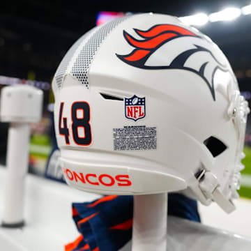Dec 2, 2024; Denver, Colorado, USA; Detailed view of the helmet worn by Denver Broncos long snapper Mitchell Fraboni (48) (not pictured) before the game against the Cleveland Browns at Empower Field at Mile High. Mandatory Credit: Ron Chenoy-Imagn Images
