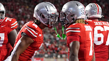 Wide receiver Emeka Egbuka #2 and running back Quinshon Judkins #1 of the Ohio State Buckeyes celebrate a touchdown during the game against the Western Michigan Broncos at Ohio Stadium on September 07, 2024 in Columbus, Ohio.