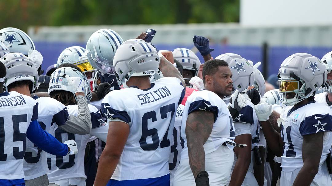 Dallas Cowboys players huddle during a joint practice against the Los Angeles Rams Dallas Cowboys players huddle during a joint practice against the Los Angeles Rams